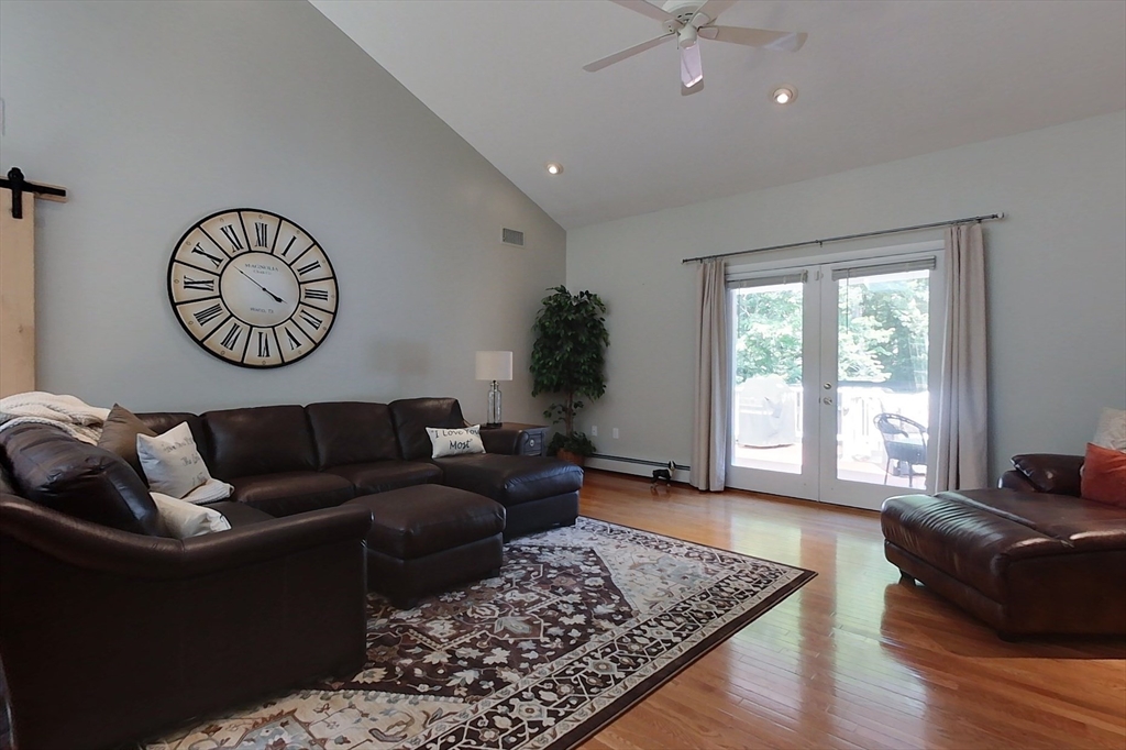 120 1/2 Lowell Road, Unit B Pepperell, MA 01463 - Photo 10 of 34 a living room with furniture and a window
