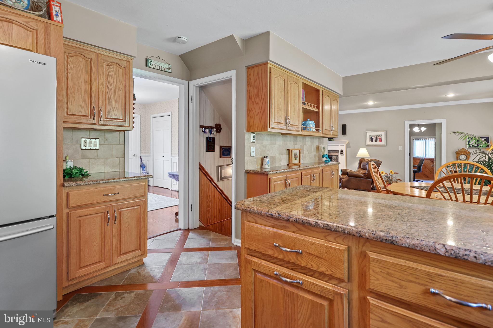 978 Weber Drive Yardley, PA 19067 - Photo 13 of 63 a kitchen with stainless steel appliances granite countertop a sink and cabinets