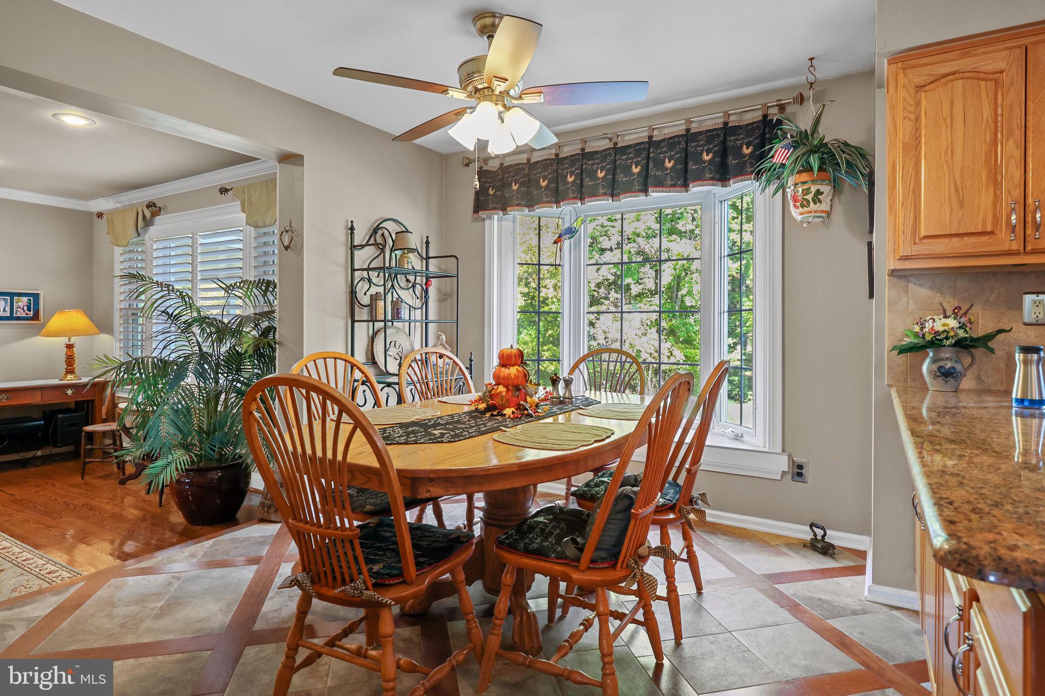 978 Weber Drive Yardley, PA 19067 - Photo 14 of 63 a view of a dining room with furniture window and outside view