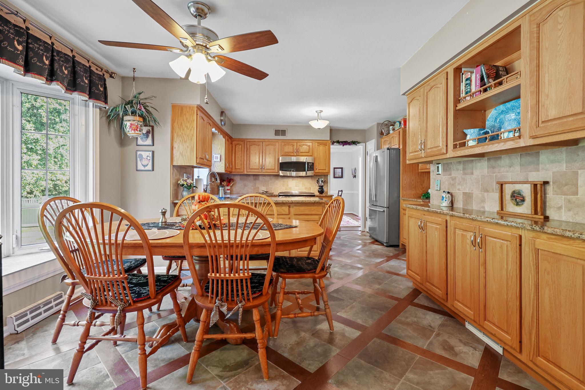 978 Weber Drive Yardley, PA 19067 - Photo 15 of 63 a dining room with furniture and window