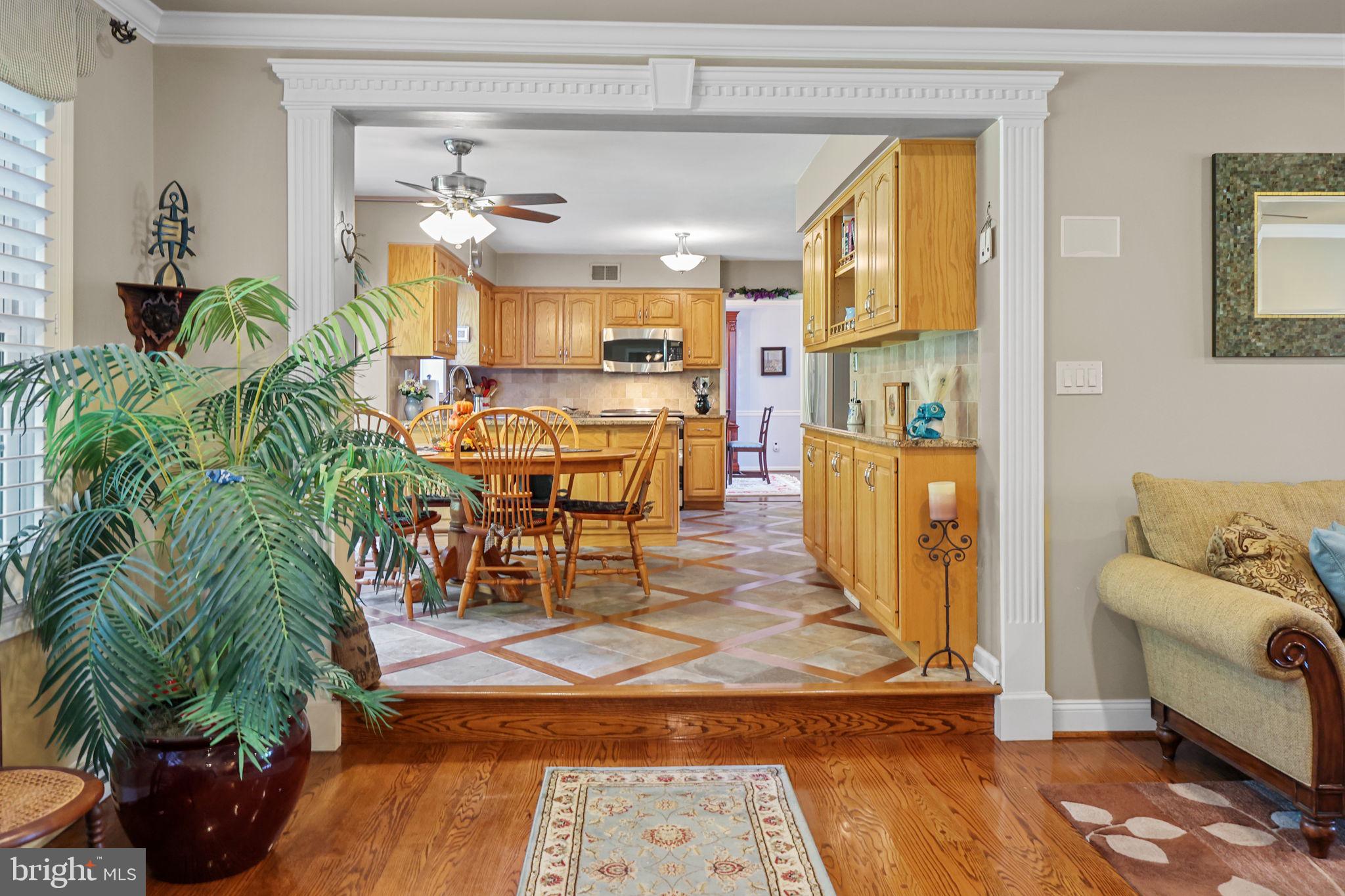 978 Weber Drive Yardley, PA 19067 - Photo 16 of 63 a living room with furniture and a floor to ceiling window