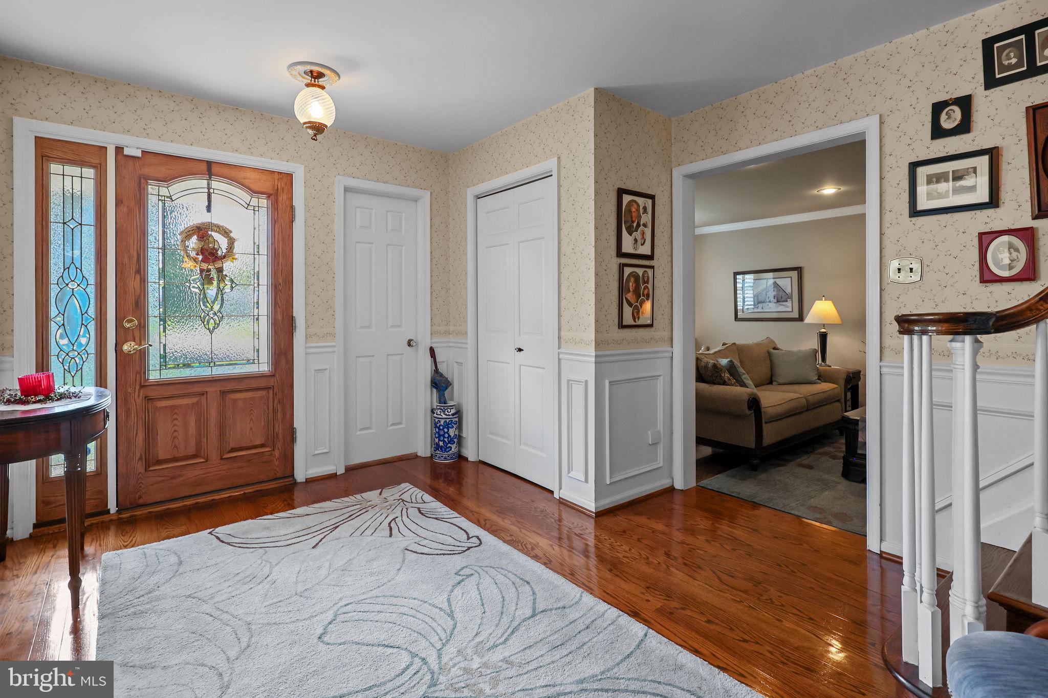 978 Weber Drive Yardley, PA 19067 - Photo 3 of 63 a bed room with a bed and a view of en suite bathroom