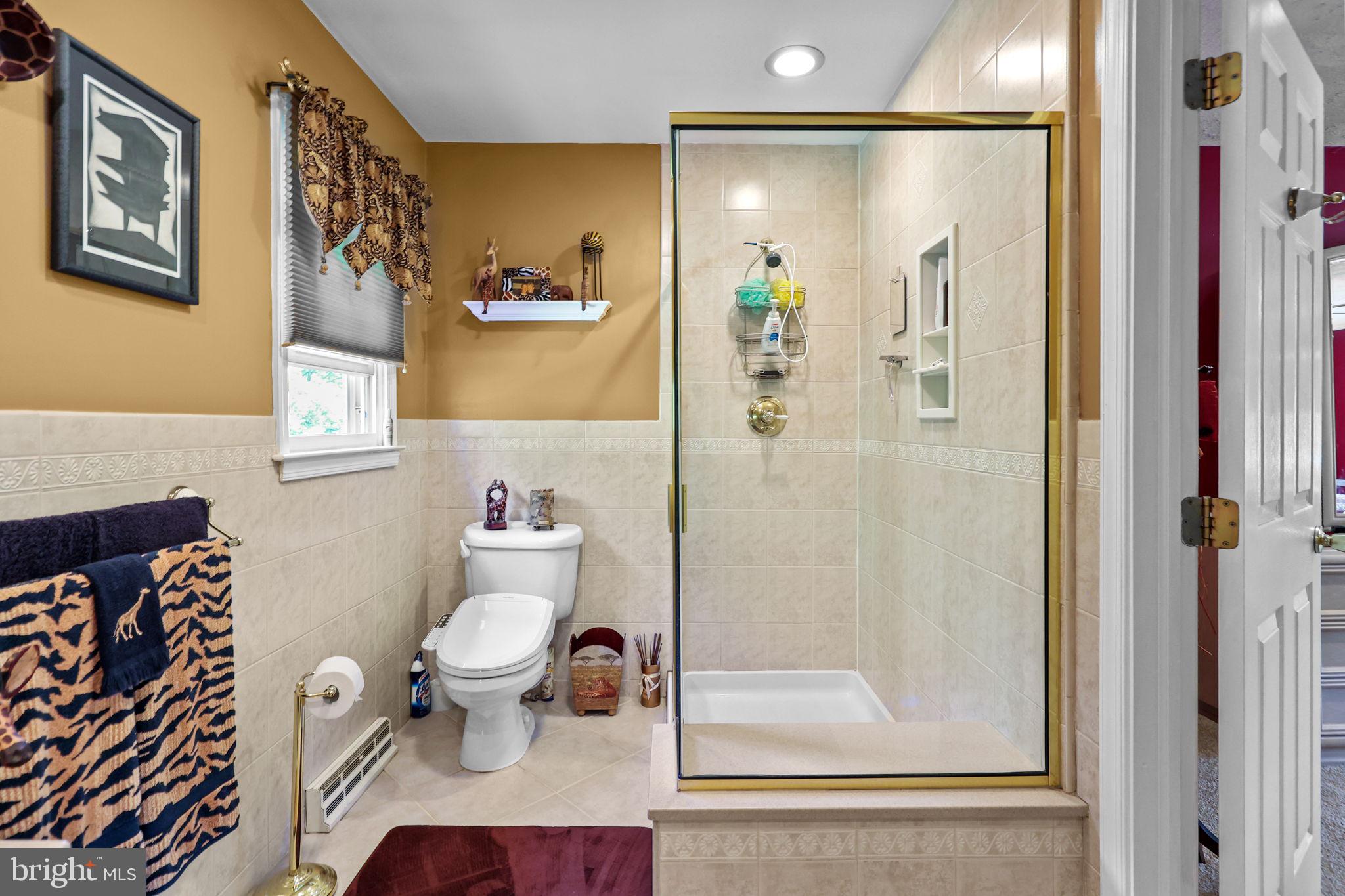 978 Weber Drive Yardley, PA 19067 - Photo 32 of 63 a bathroom with a bathtub and a toilet