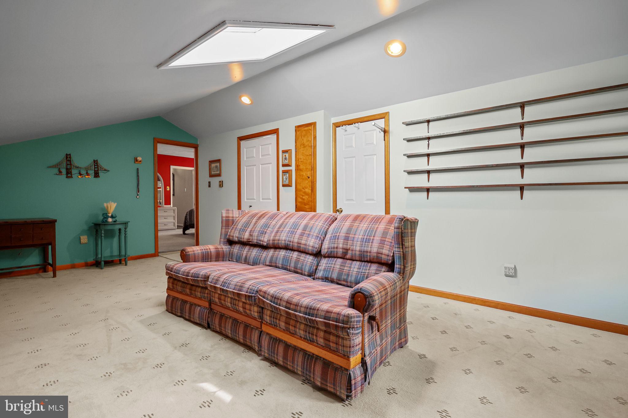 978 Weber Drive Yardley, PA 19067 - Photo 35 of 63 a living room with furniture and a ceiling fan