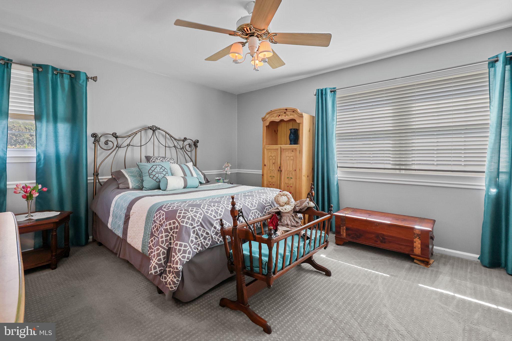 978 Weber Drive Yardley, PA 19067 - Photo 38 of 63 a bed sitting in a bedroom next to a window