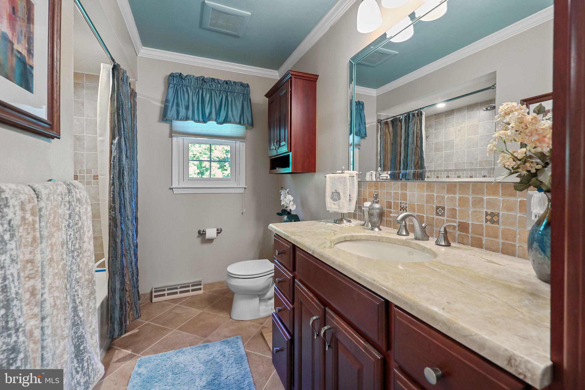 978 Weber Drive Yardley, PA 19067 - Photo 41 of 63 a bathroom with a granite countertop sink toilet and shower