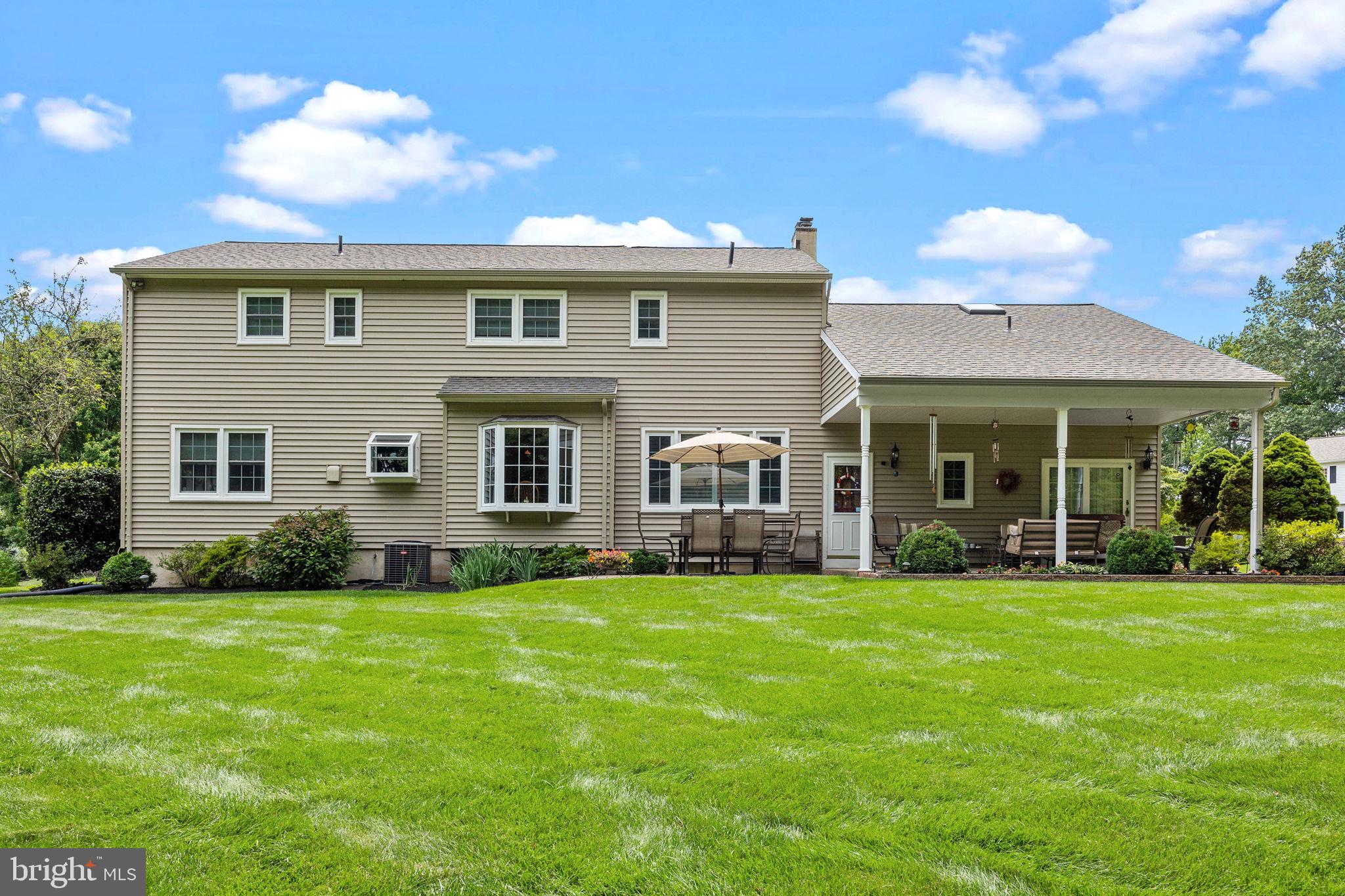 978 Weber Drive Yardley, PA 19067 - Photo 54 of 63 a view of a house with a yard and sitting area