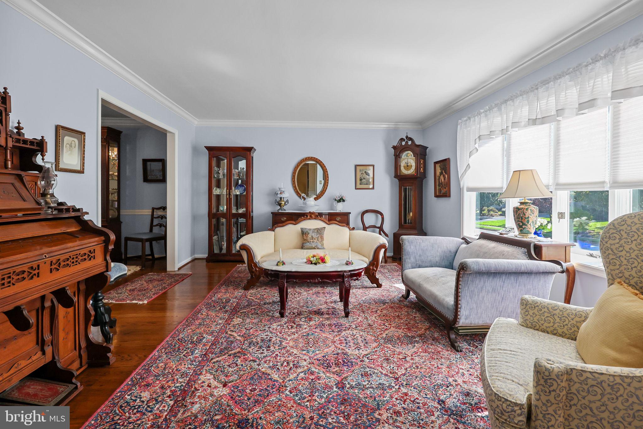 978 Weber Drive Yardley, PA 19067 - Photo 6 of 63 a living room with furniture a rug and a large window