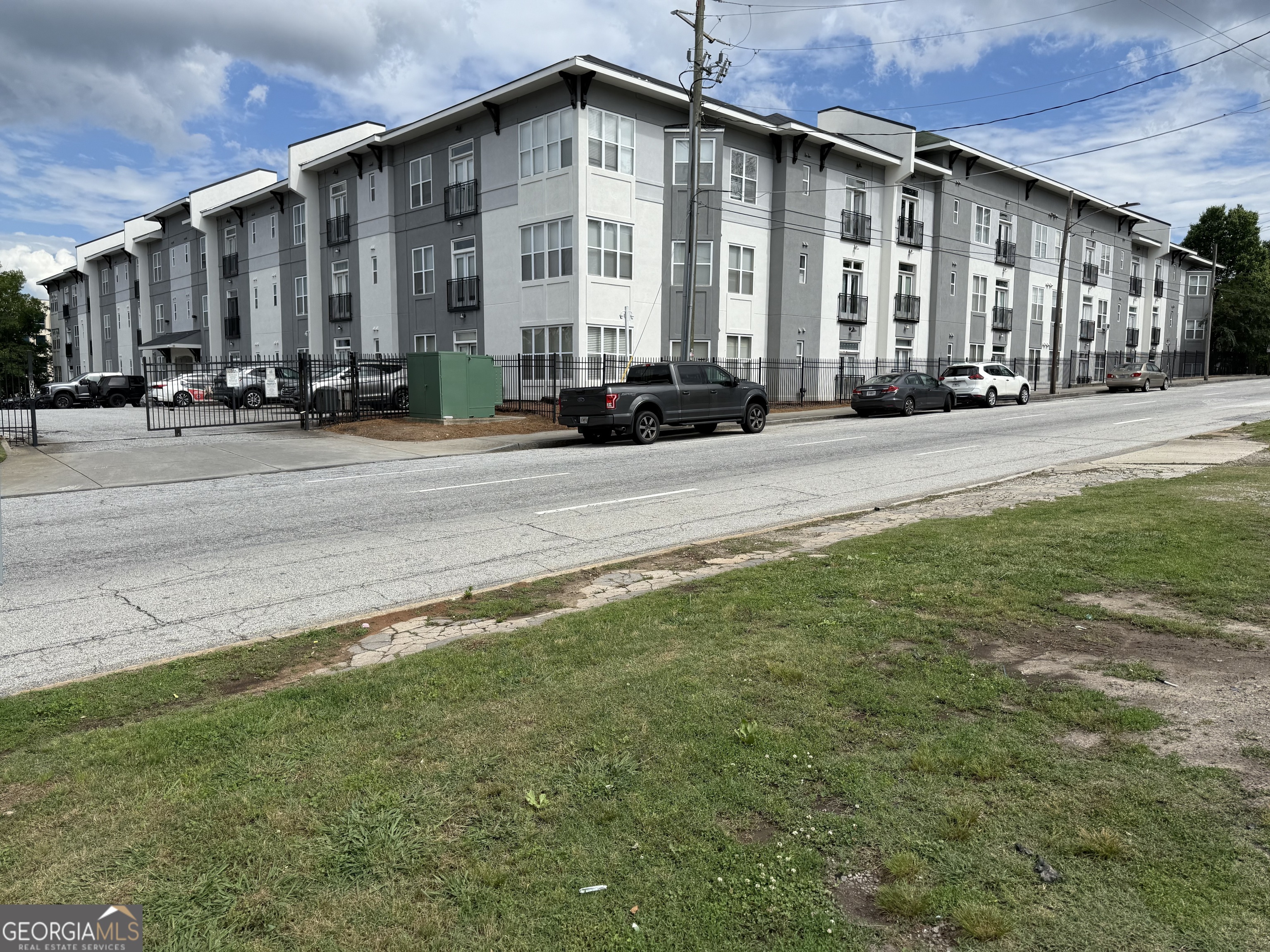 a view of a building along the street