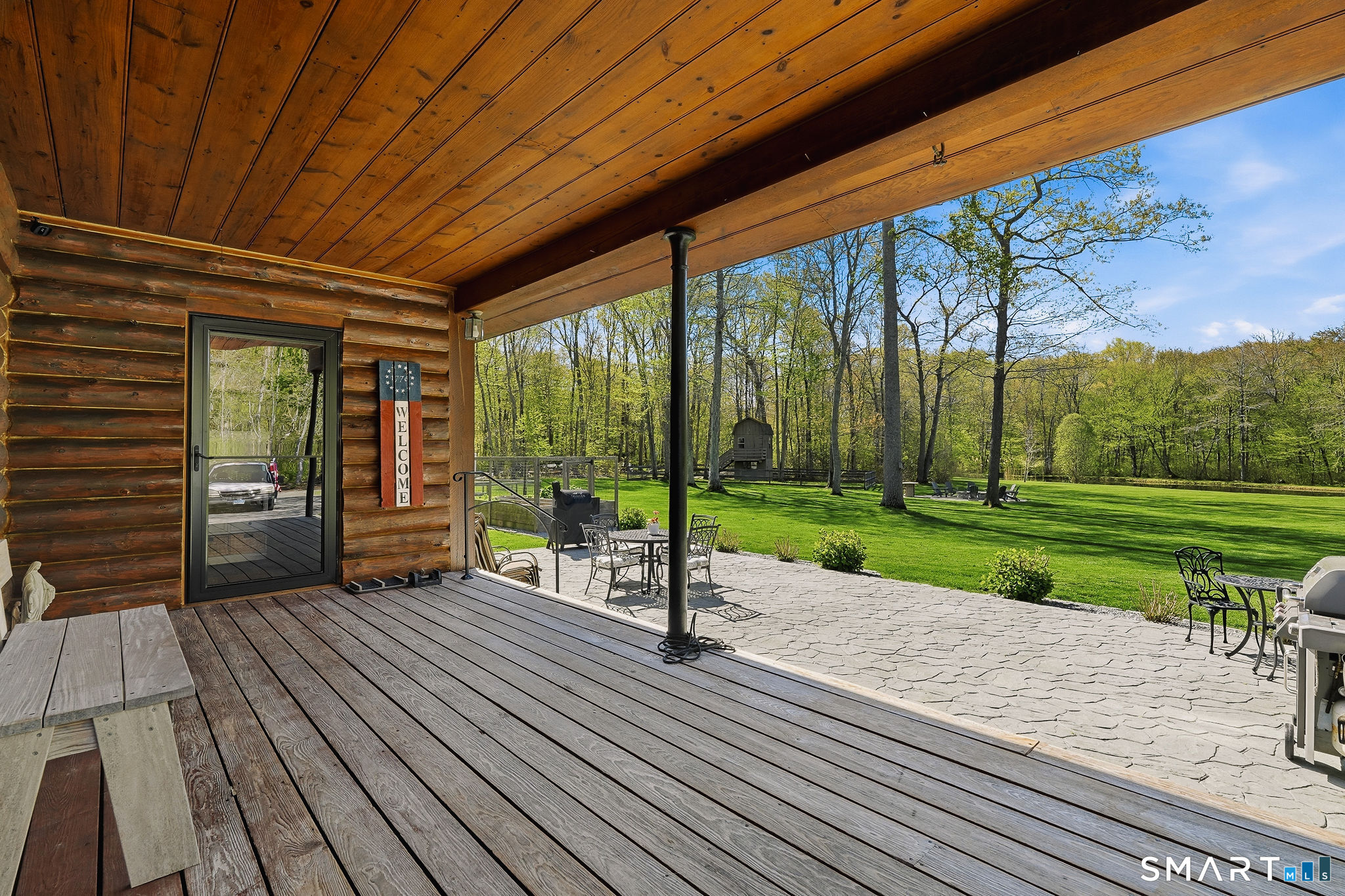 61 Mystic Road North Stonington, CT 06359 - Photo 29 of 40 a view of a room with porch and wooden floor