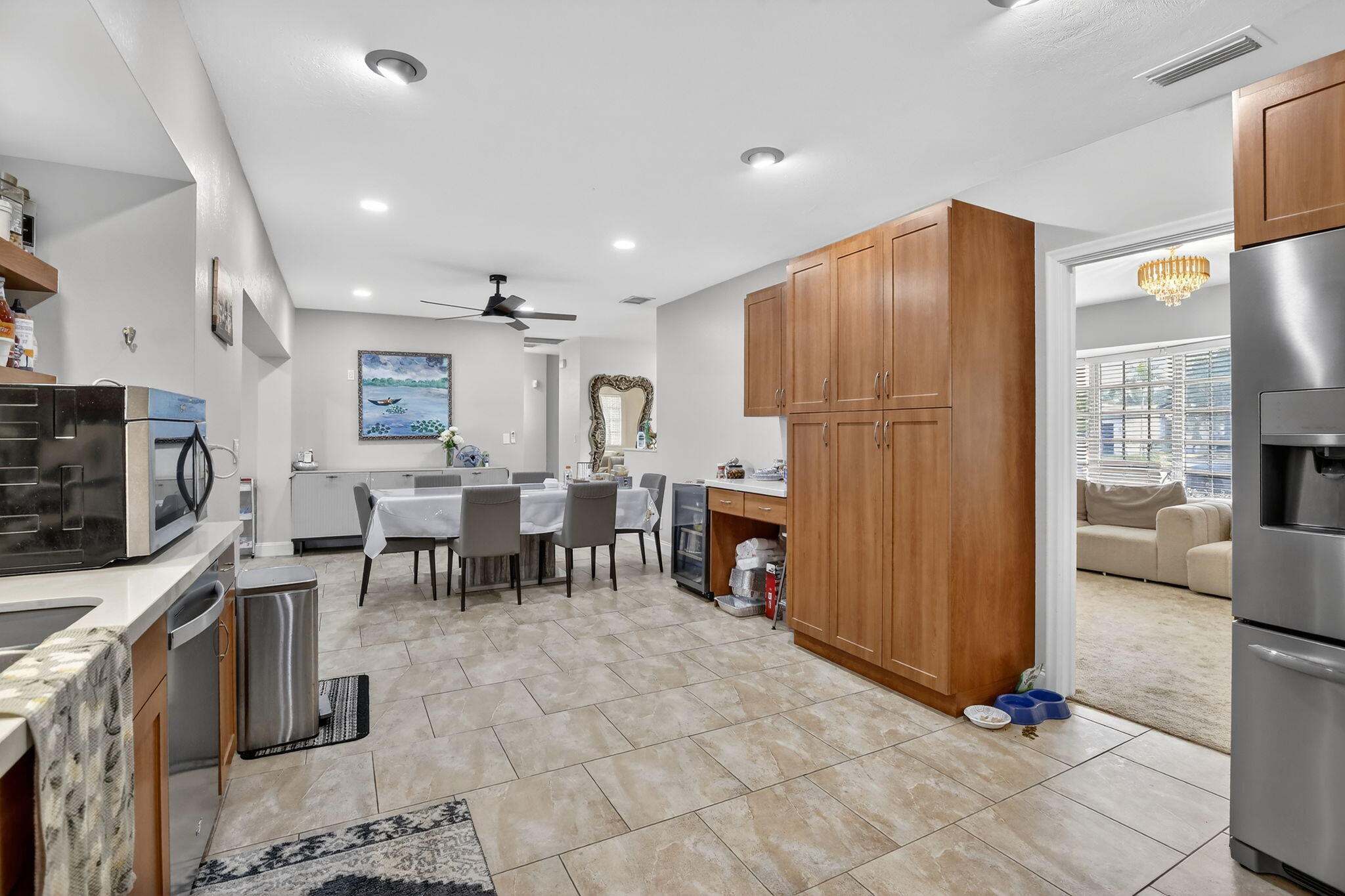 5507 McKinley Street Hollywood, FL 33021 - Photo 15 of 60 a living room with patio furniture and a flat screen tv