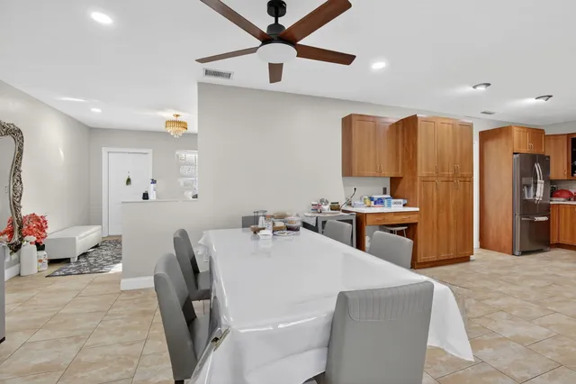 a living room with furniture and flowers