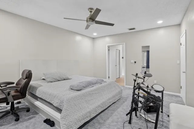 a bathroom with a sink a toilet and vanity