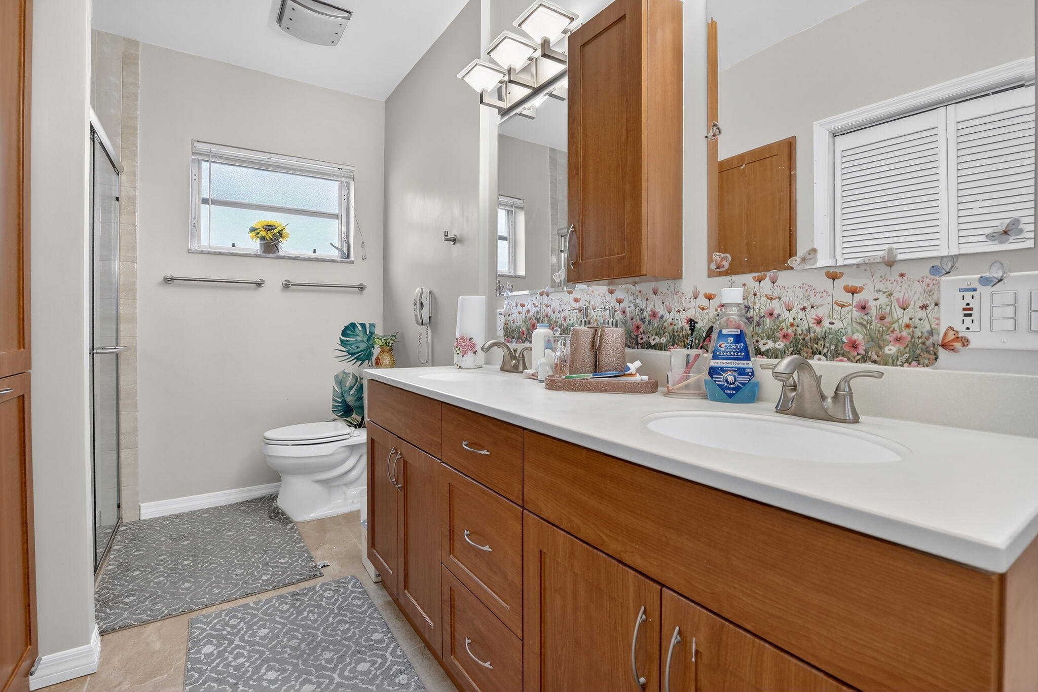 5507 McKinley Street Hollywood, FL 33021 - Photo 39 of 60 a bathroom with a granite countertop sink mirror and toilet