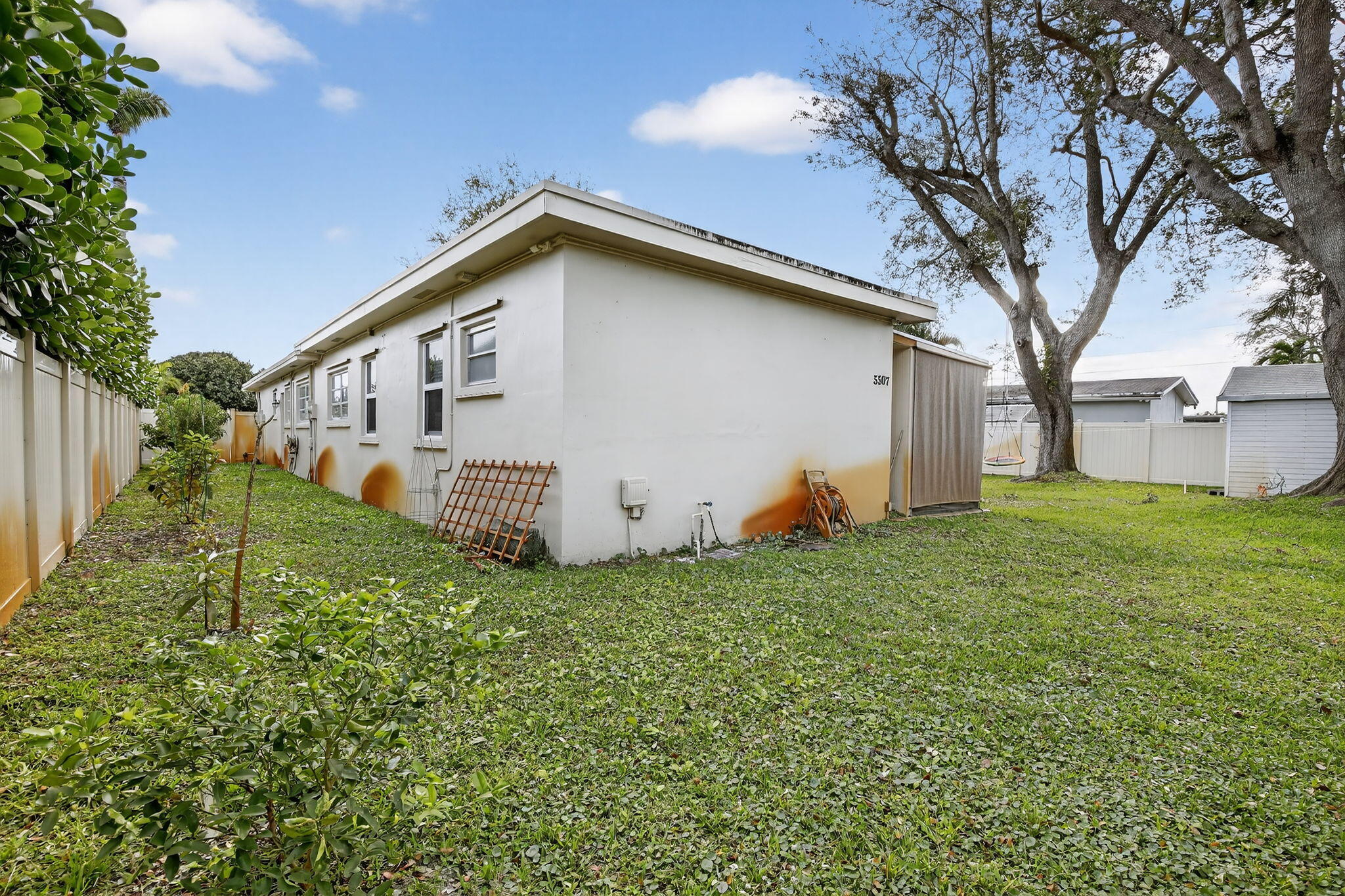5507 McKinley Street Hollywood, FL 33021 - Photo 50 of 60 a view of a house with backyard