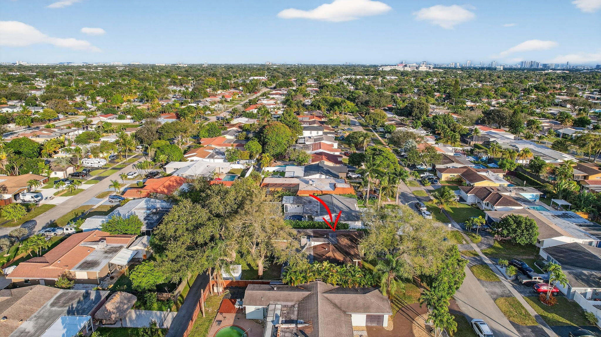 5507 McKinley Street Hollywood, FL 33021 - Photo 55 of 60 an aerial view of residential houses with outdoor space and trees