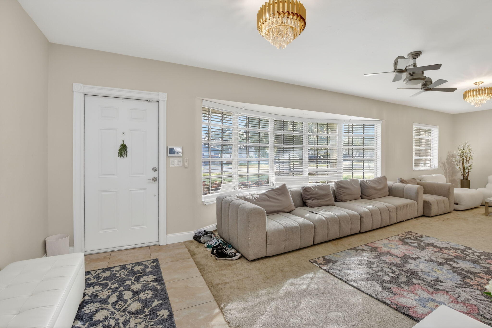 5507 McKinley Street Hollywood, FL 33021 - Photo 7 of 60 a living room with furniture and a window