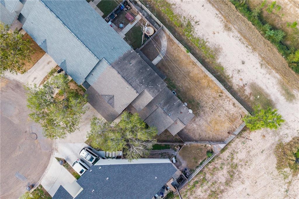2601 Nassau Street Edinburg, TX 78541 - Photo 12 of 15 an aerial view of a house with a yard and a large tree
