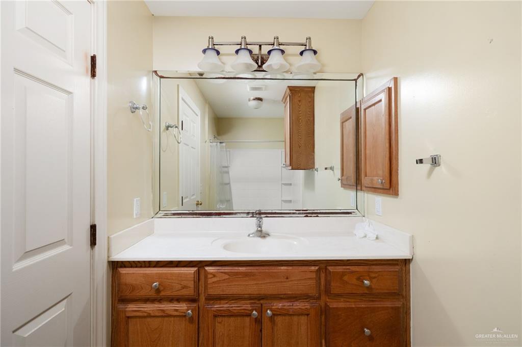 2601 Nassau Street Edinburg, TX 78541 - Photo 7 of 15 a bathroom with a sink and a mirror