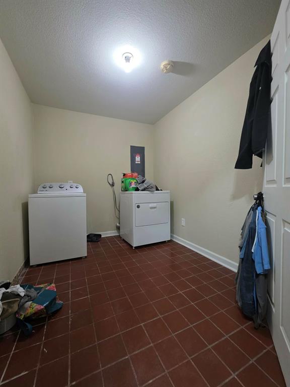 739 Bluebonnet Street Mexia, TX 76667 - Photo 20 of 28 a room with a window and storage space