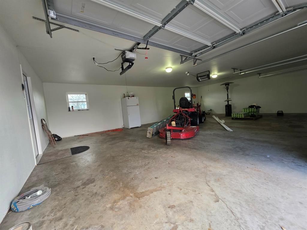 739 Bluebonnet Street Mexia, TX 76667 - Photo 25 of 28 a view of a big room with gym equipment