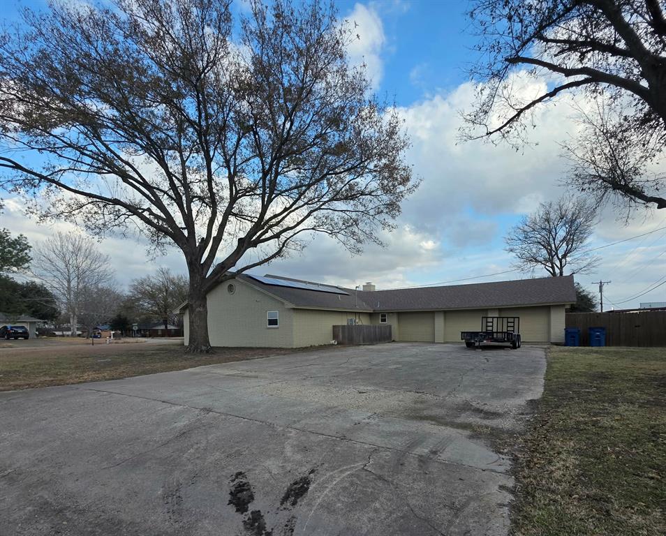 739 Bluebonnet Street Mexia, TX 76667 - Photo 27 of 28 a view of a house with a snow in the yard