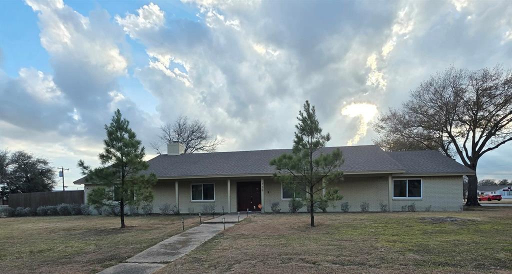 739 Bluebonnet Street Mexia, TX 76667 - Photo 28 of 28 a front view of a house with a yard