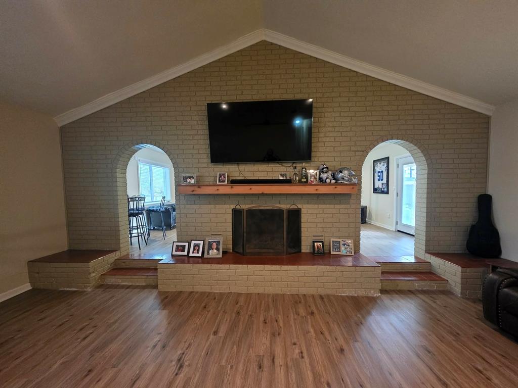 739 Bluebonnet Street Mexia, TX 76667 - Photo 4 of 28 a living room with furniture and a flat screen tv