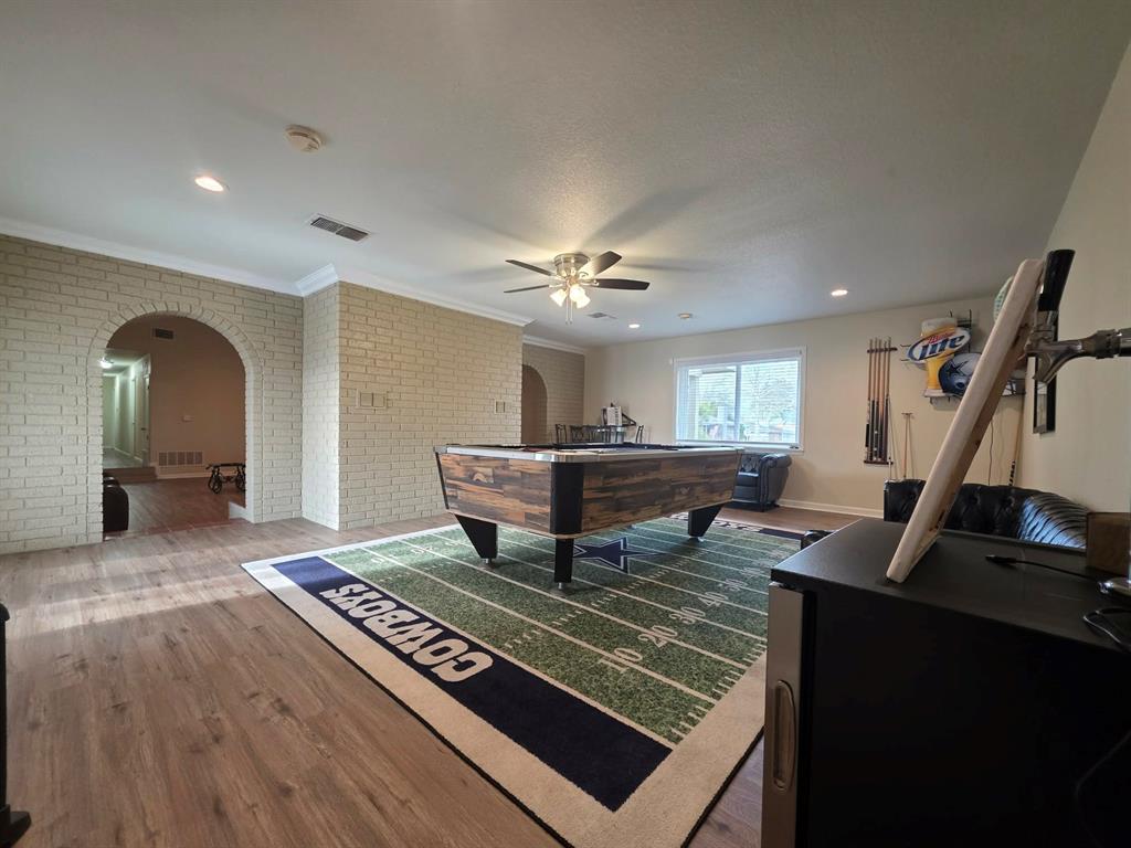 739 Bluebonnet Street Mexia, TX 76667 - Photo 8 of 28 a living room with furniture and a rug