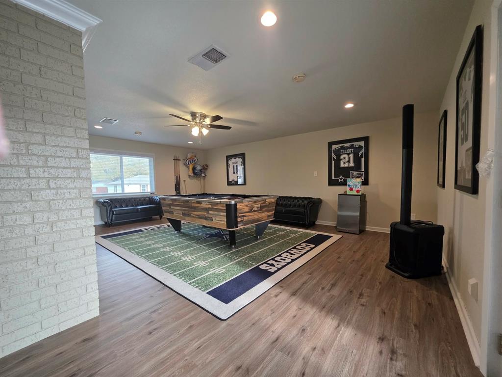 739 Bluebonnet Street Mexia, TX 76667 - Photo 9 of 28 a living room with furniture rug and wooden floor