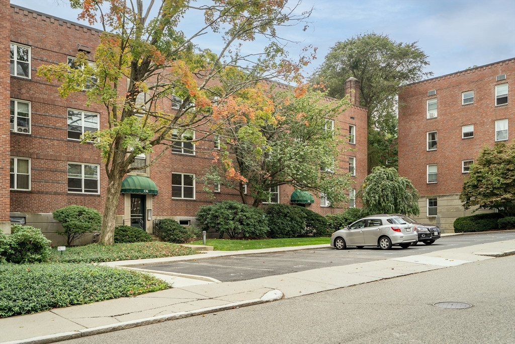 136 Beaconsfield Road, Unit 6 Brookline, MA 02445 - Photo 14 of 17 a car parked on the side of a street