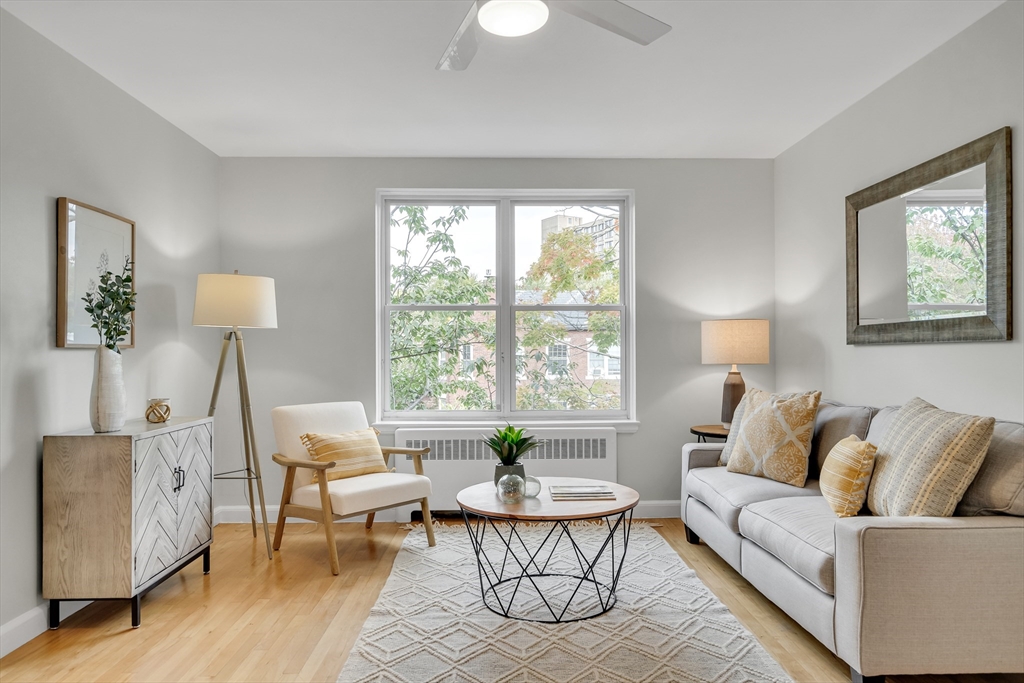 136 Beaconsfield Road, Unit 6 Brookline, MA 02445 - Photo 2 of 17 a living room with furniture and a window