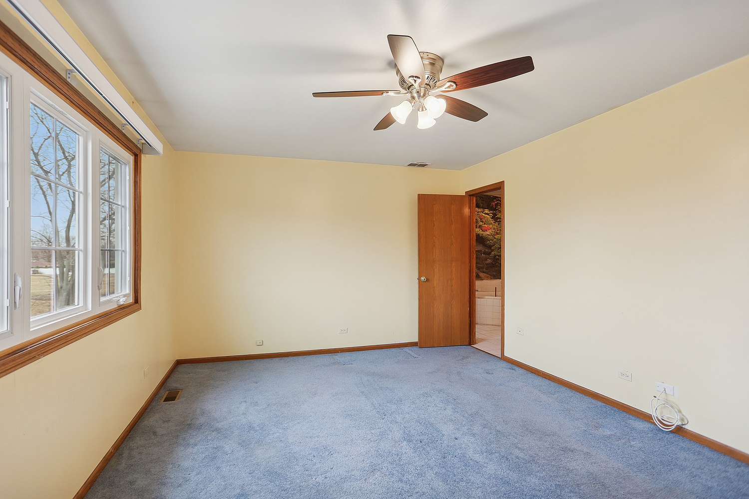 11030 South Roberts Road, Unit 1 Palos Hills, IL 60465 - Photo 13 of 16 a view of an empty room with a window