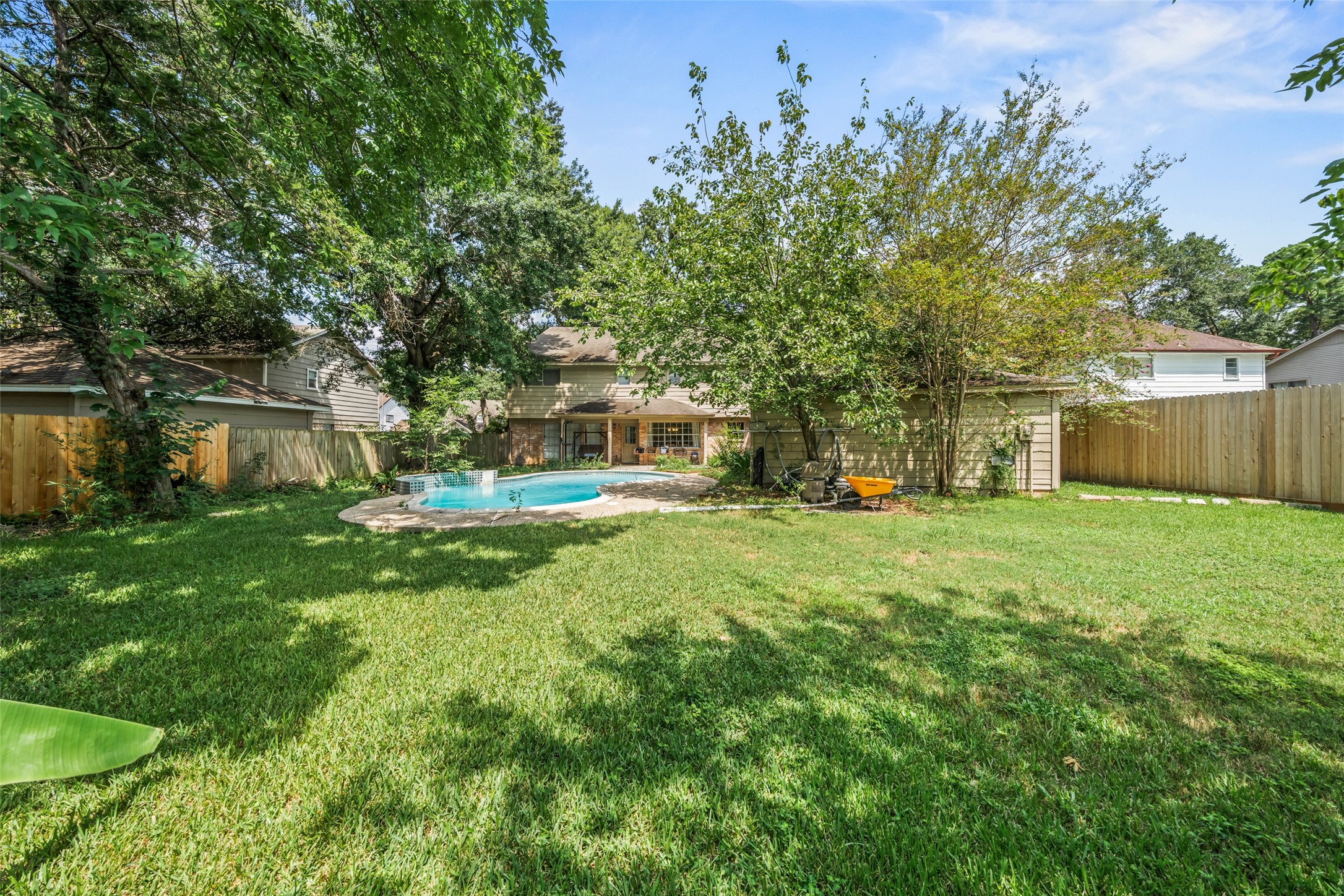715 Marne Lane Houston, TX 77090 - Photo 24 of 25 a view of a house with backyard and sitting area