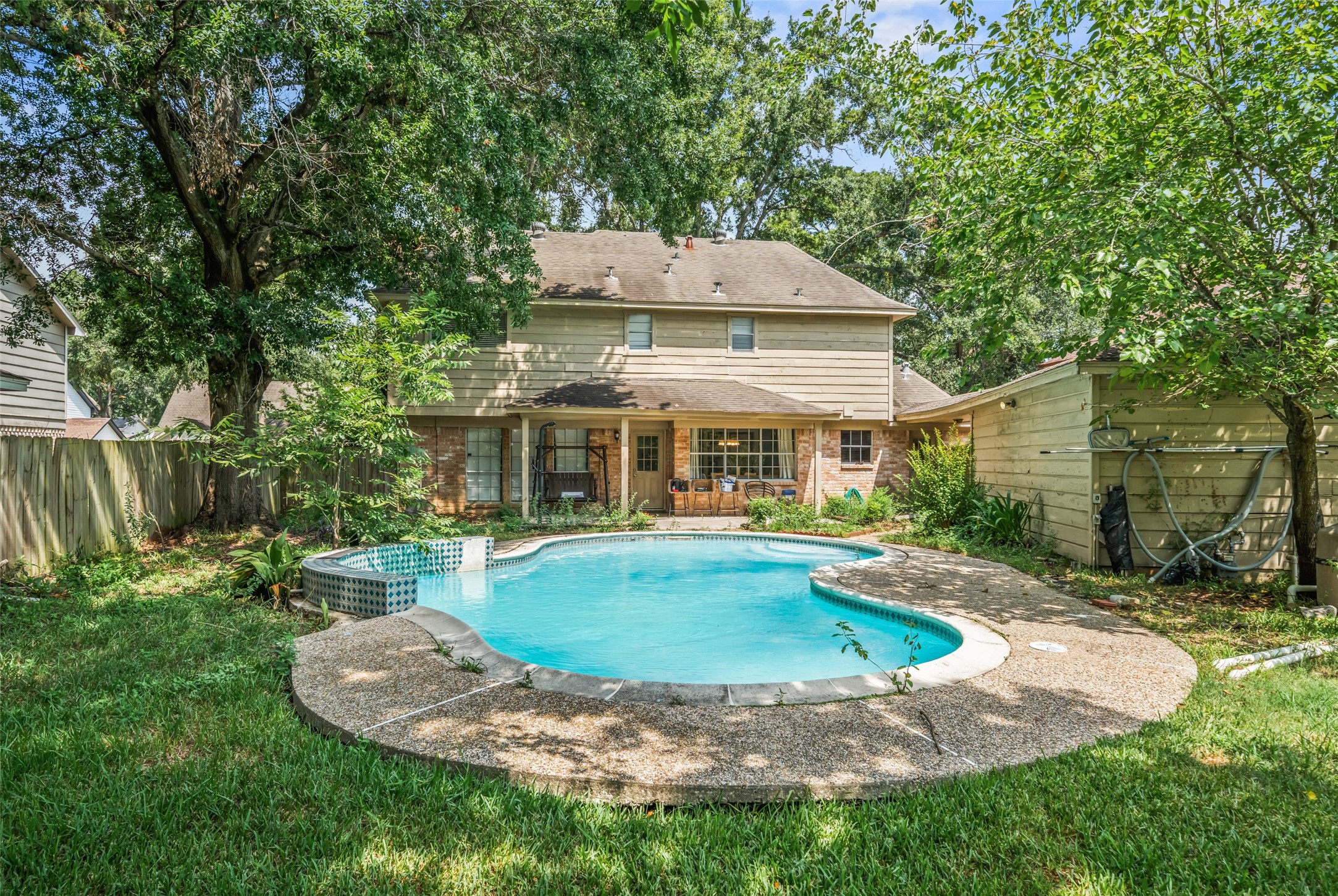 715 Marne Lane Houston, TX 77090 - Photo 25 of 25 a front view of a house with a yard
