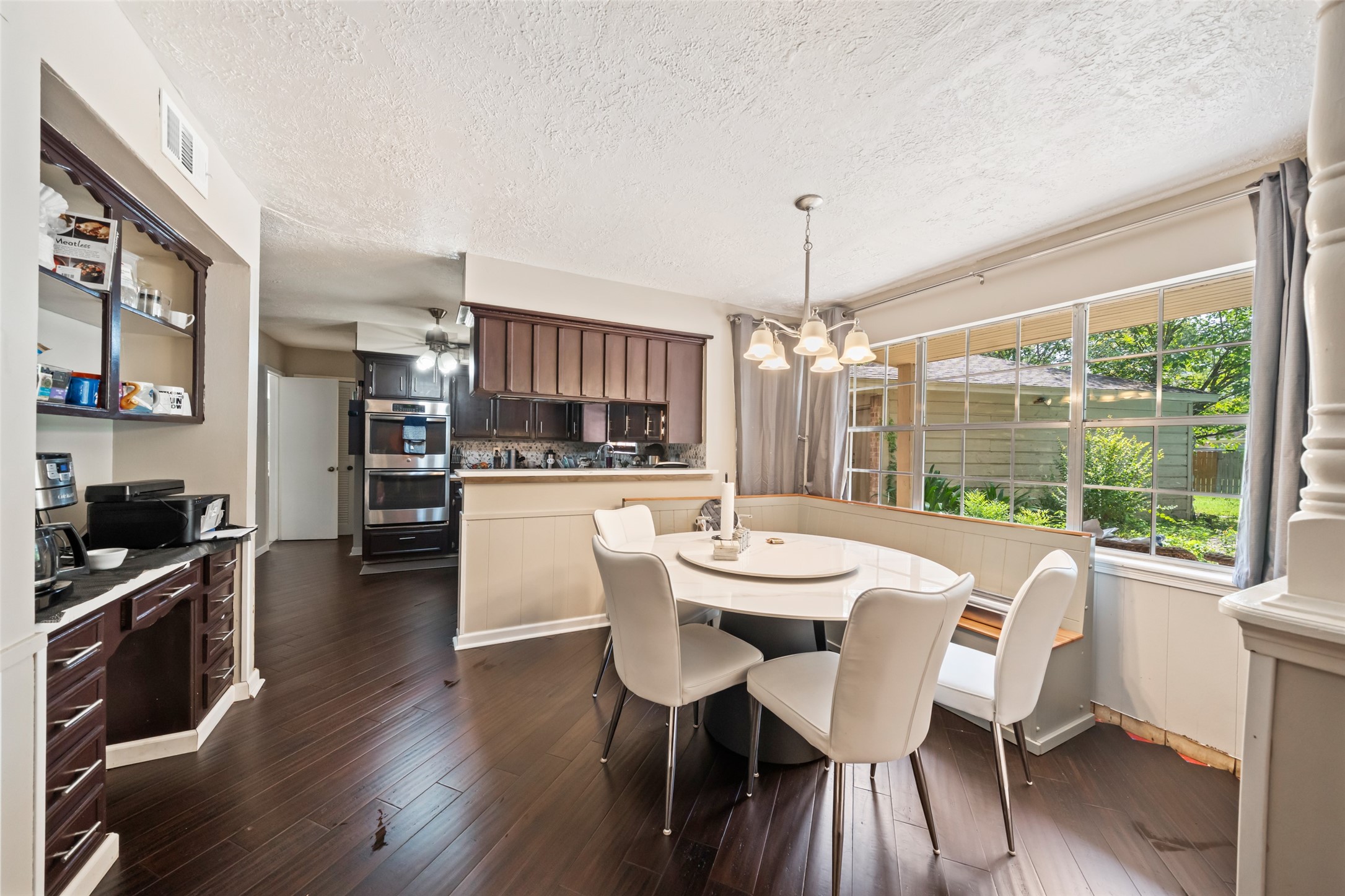 715 Marne Lane Houston, TX 77090 - Photo 5 of 25 a view of a dining room with furniture window and wooden floor