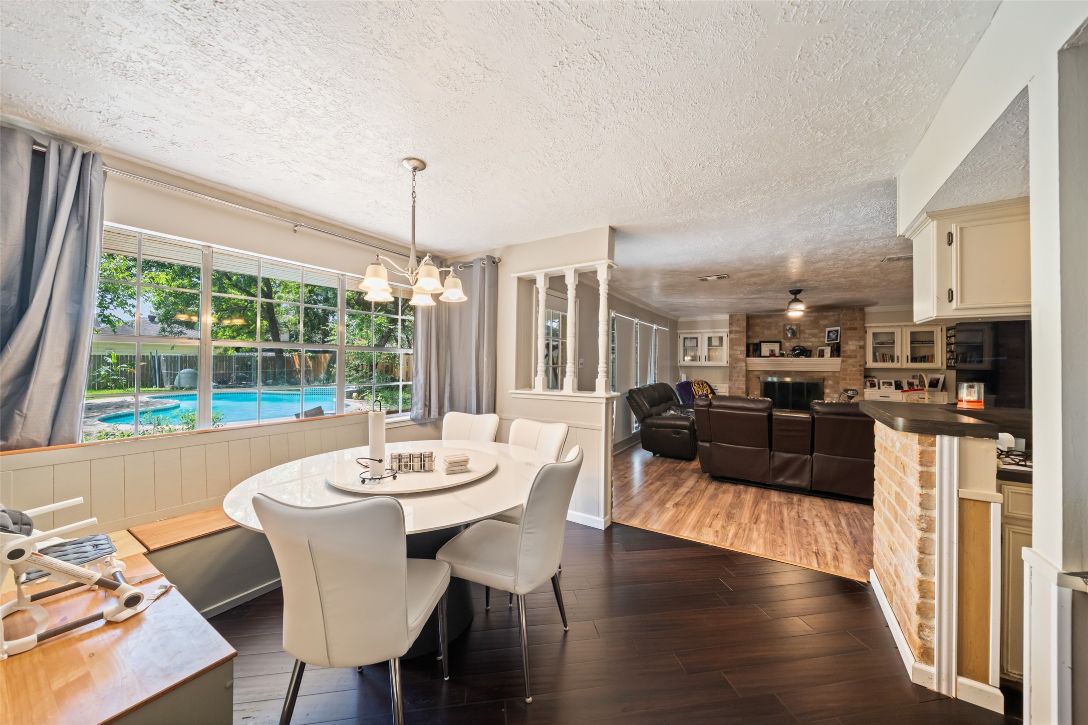 715 Marne Lane Houston, TX 77090 - Photo 7 of 25 a view of a dining room with furniture window and wooden floor