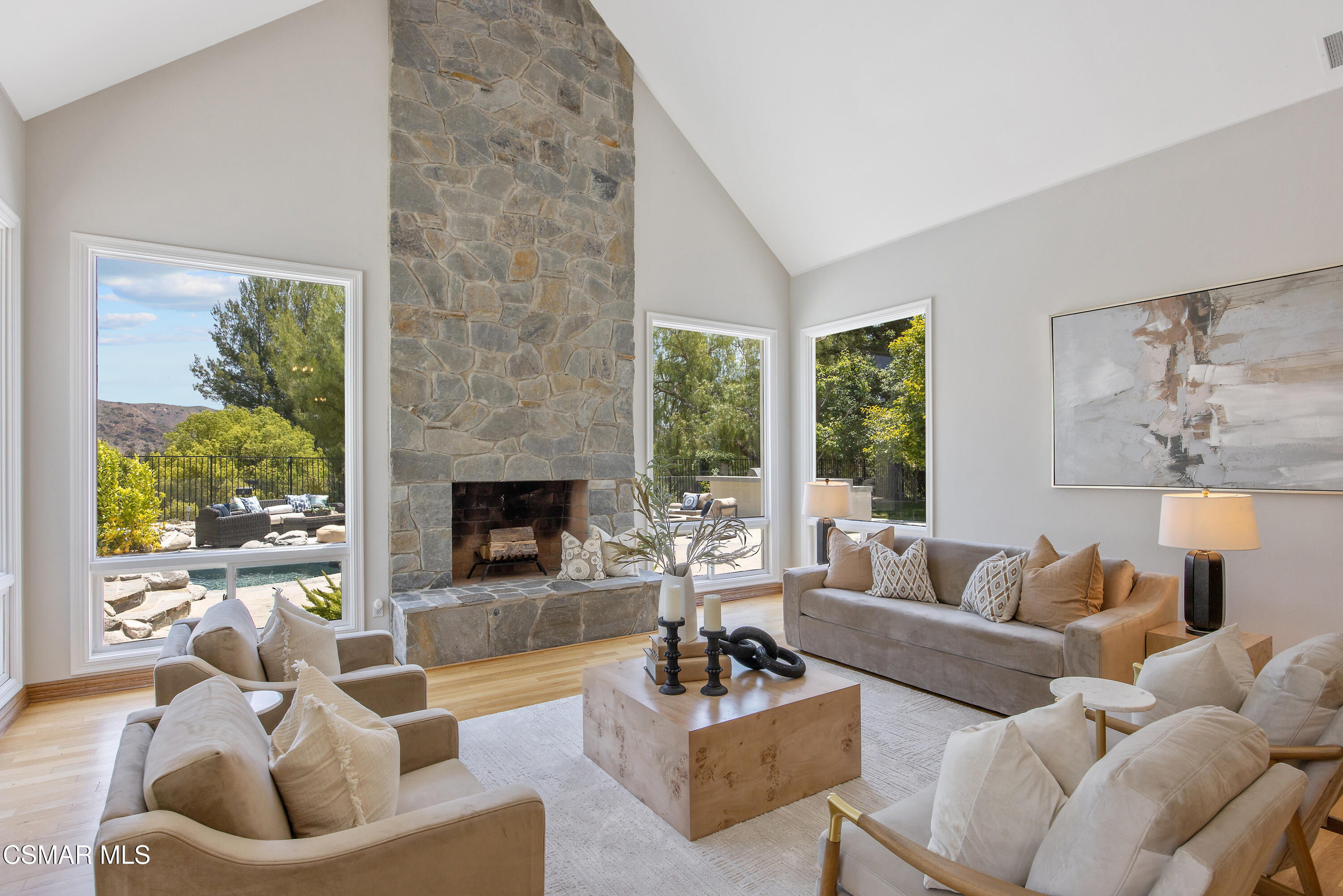 3840 Castle View Road Agoura Hills, CA 91301 - Photo 12 of 94 a living room with furniture and a large window