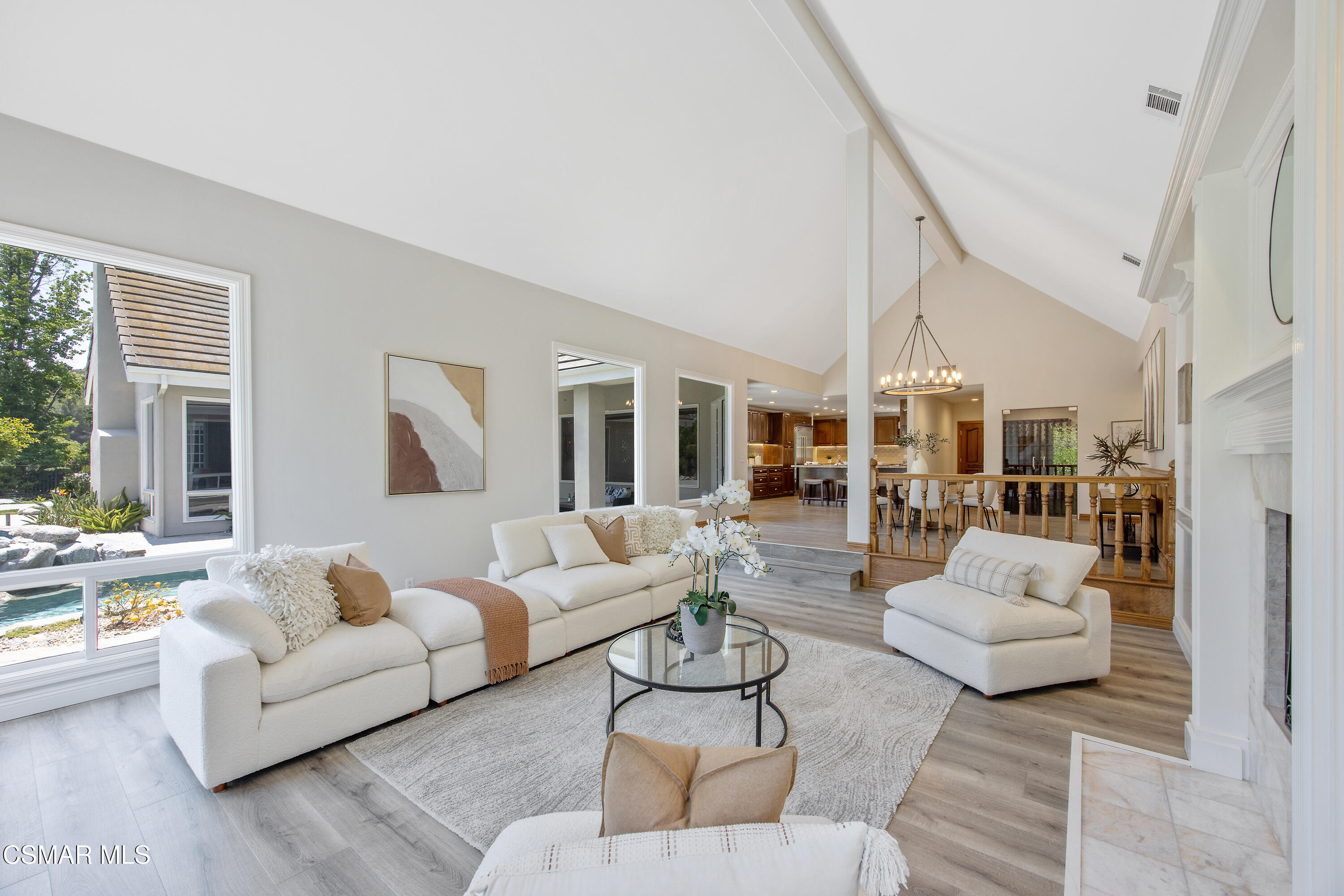 3840 Castle View Road Agoura Hills, CA 91301 - Photo 29 of 94 a living room with furniture and a large window