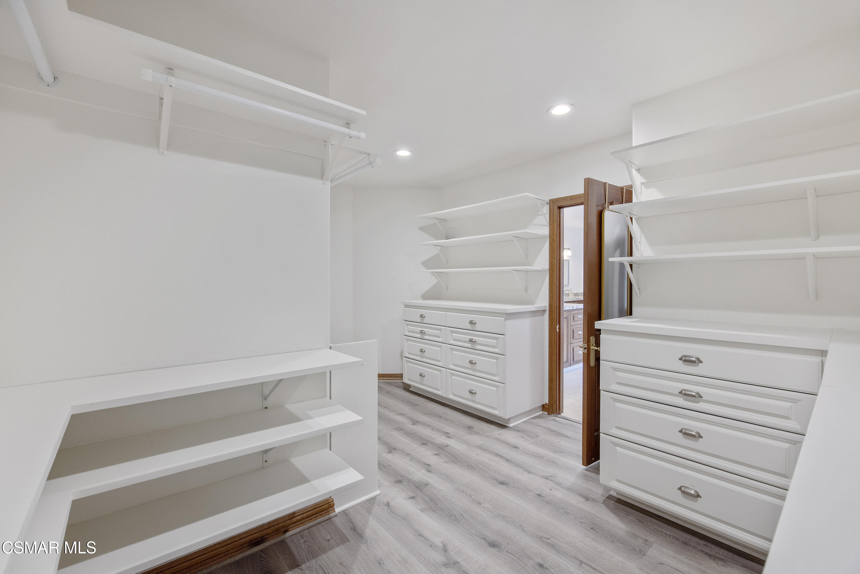 3840 Castle View Road Agoura Hills, CA 91301 - Photo 38 of 94 a view of walk in closet with empty racks