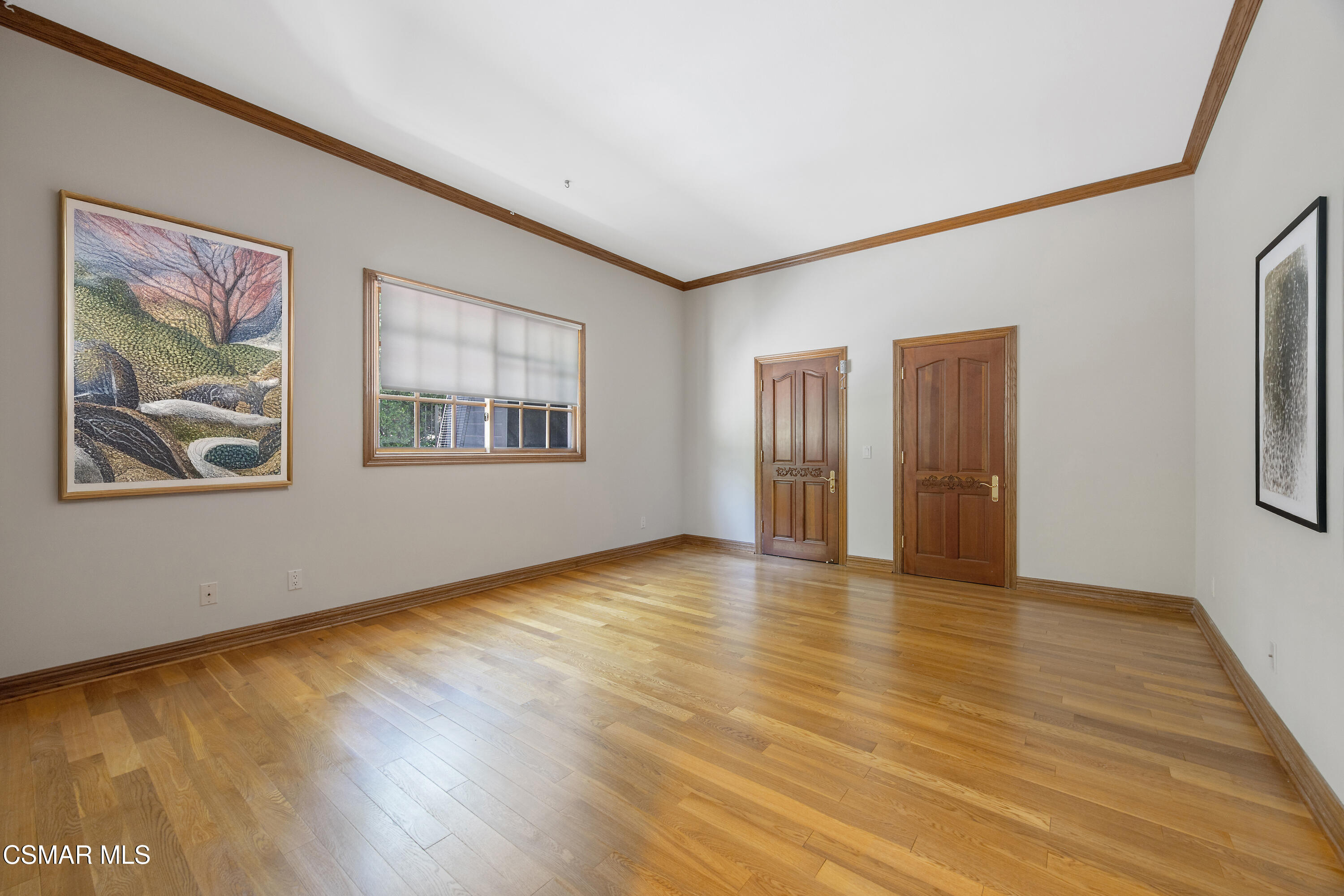 3840 Castle View Road Agoura Hills, CA 91301 - Photo 39 of 94 a view of an empty room with window and wooden floor