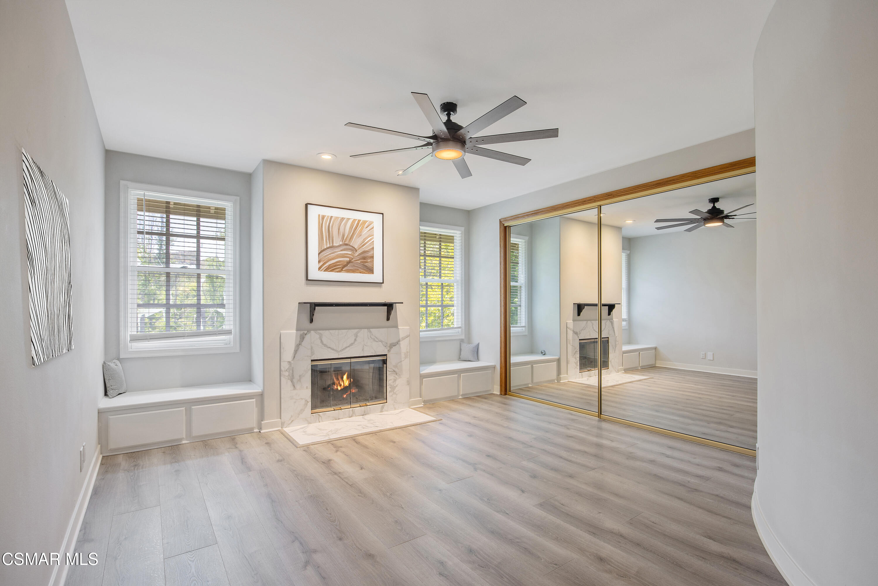3840 Castle View Road Agoura Hills, CA 91301 - Photo 46 of 94 a view of an empty room with a window and a fireplace