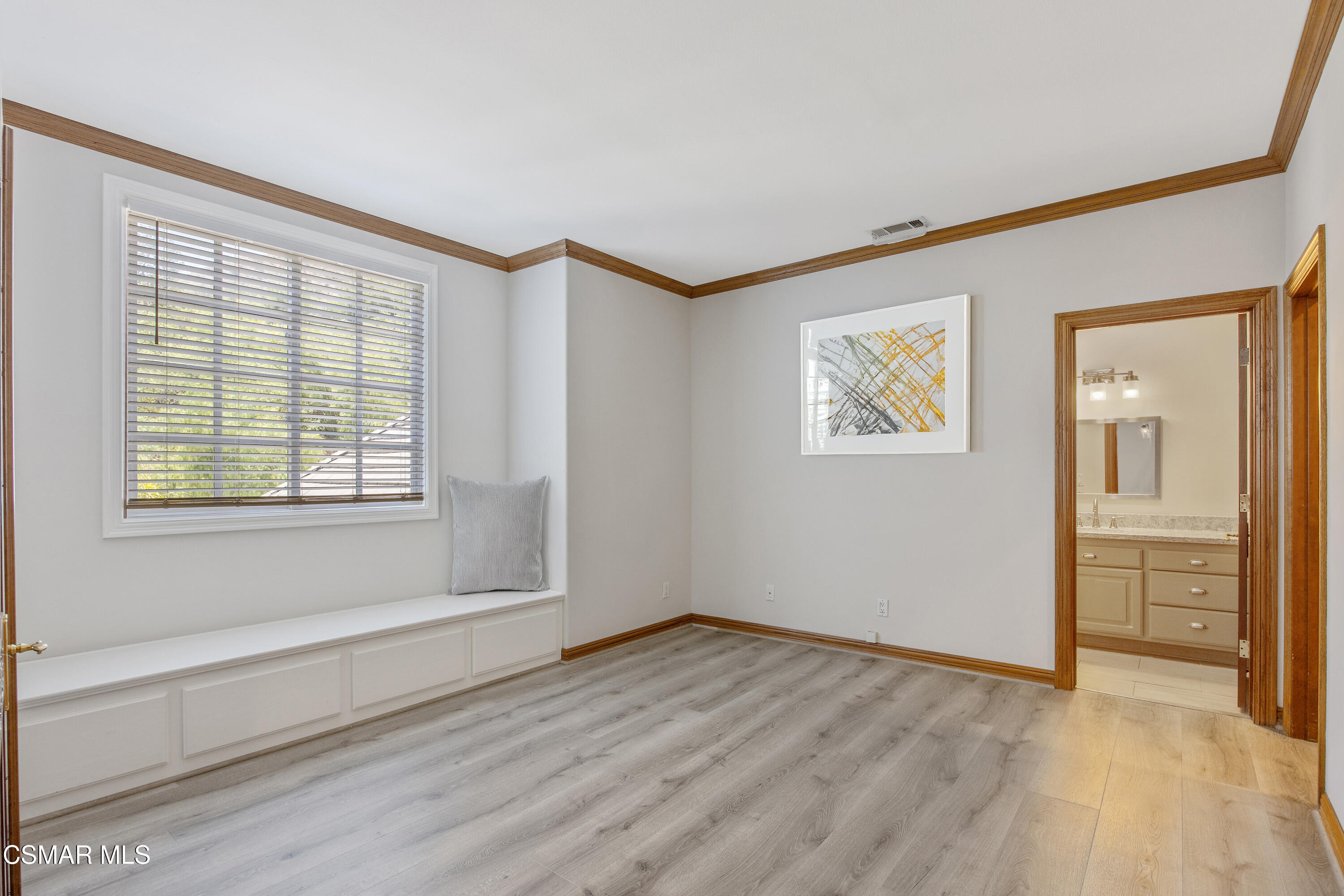 3840 Castle View Road Agoura Hills, CA 91301 - Photo 48 of 94 a view of an empty room with wooden floor and a window