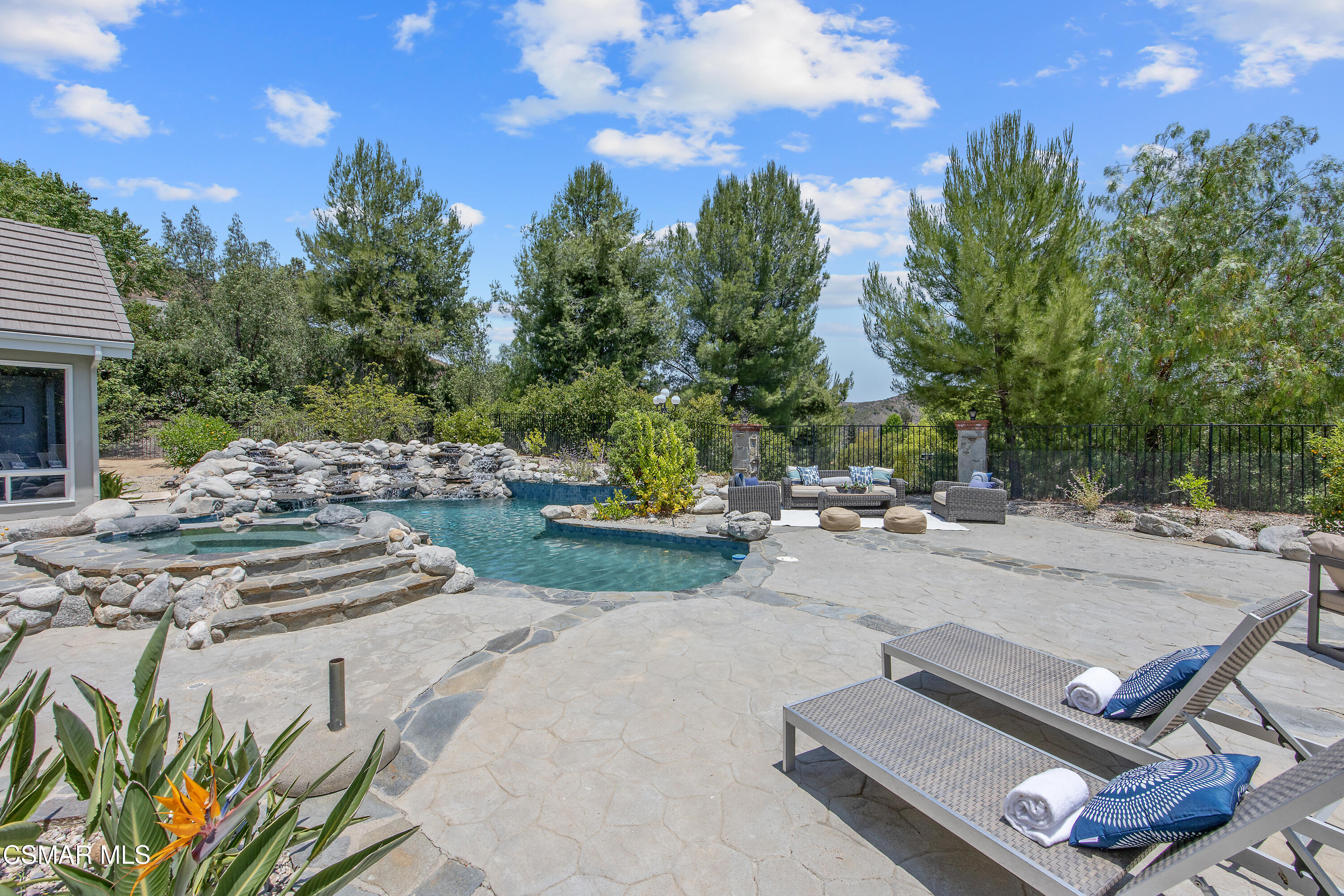 3840 Castle View Road Agoura Hills, CA 91301 - Photo 68 of 94 a view of a swimming pool with a patio