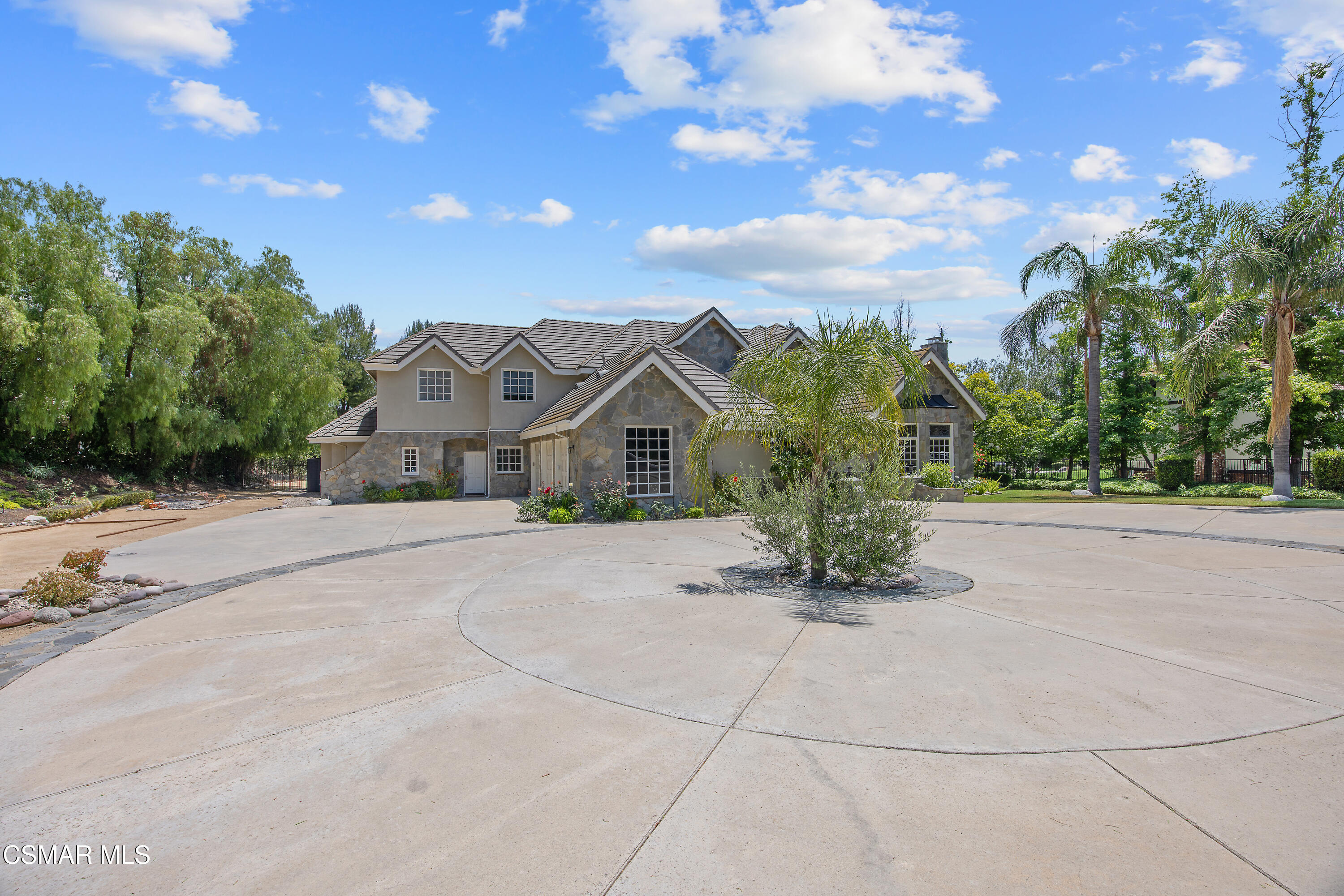 3840 Castle View Road Agoura Hills, CA 91301 - Photo 74 of 94 a view of a house with a yard and potted plants