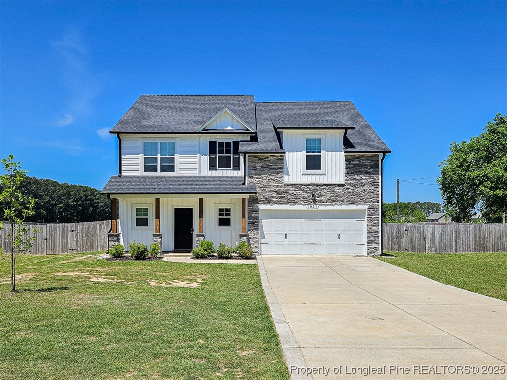 7837 Maxwell Road Stedman, NC 28391 - Photo 1 of 11 a front view of a house with a yard