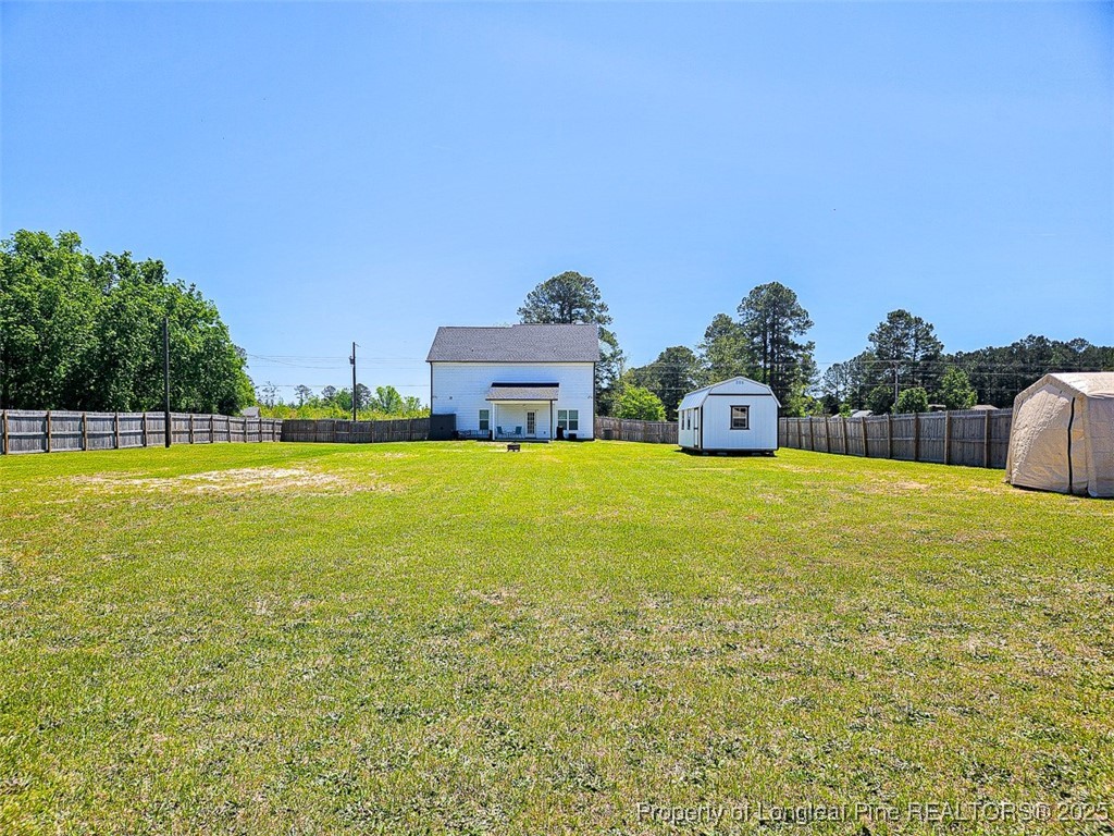 7837 Maxwell Road Stedman, NC 28391 - Photo 11 of 11 a house view with swimming pool in front of it