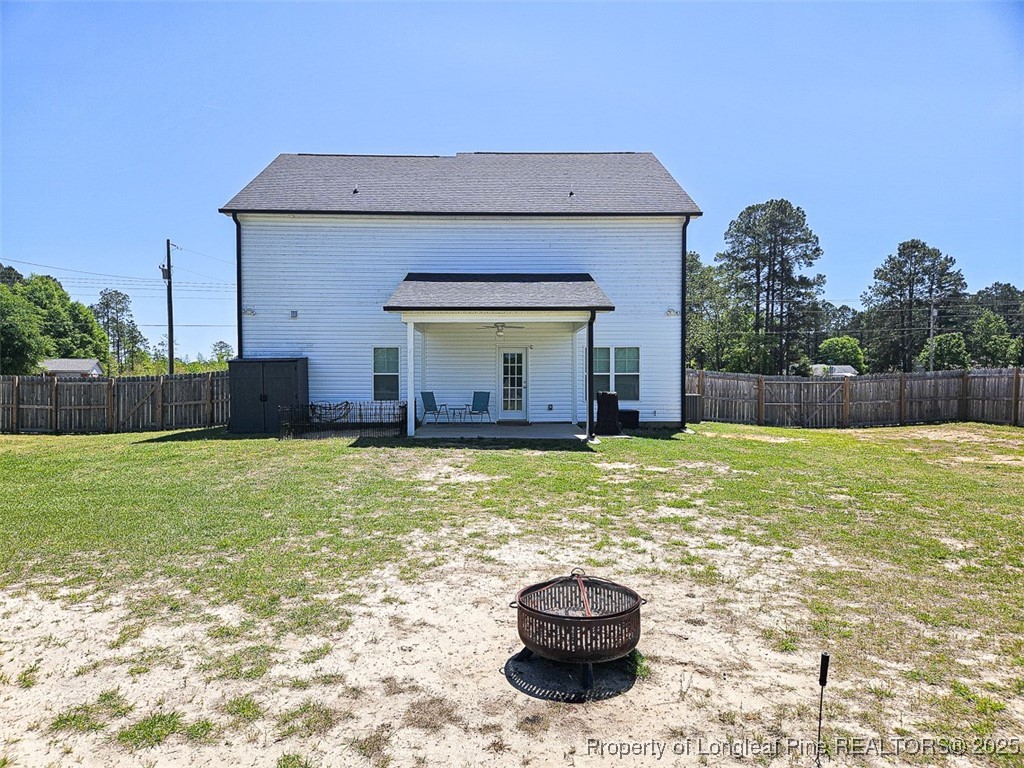 7837 Maxwell Road Stedman, NC 28391 - Photo 7 of 11 a view of a house with backyard and sitting area