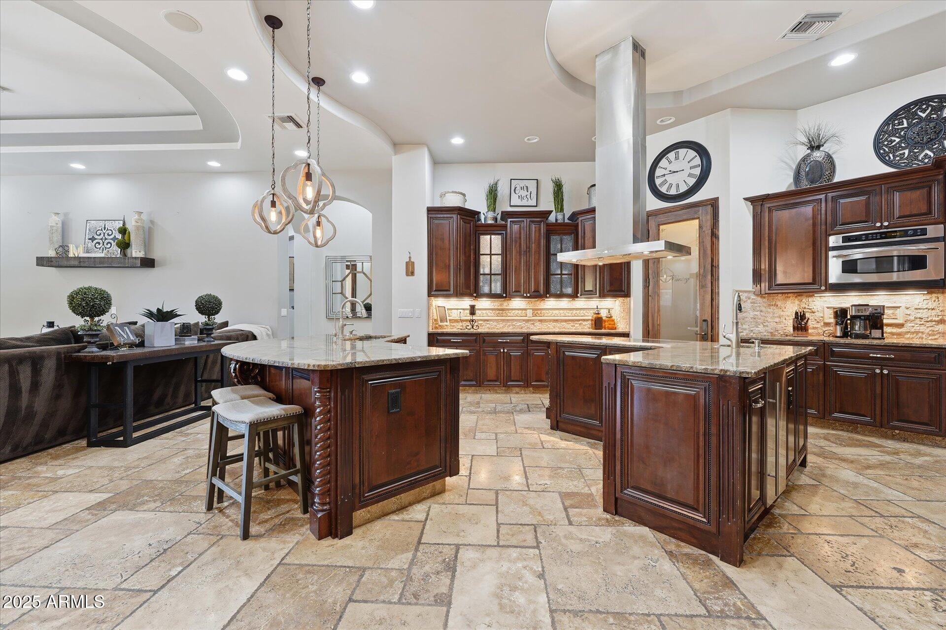 3121 East Bonanza Court Gilbert, AZ 85297 - Photo 18 of 83 a kitchen with a sink and cabinets