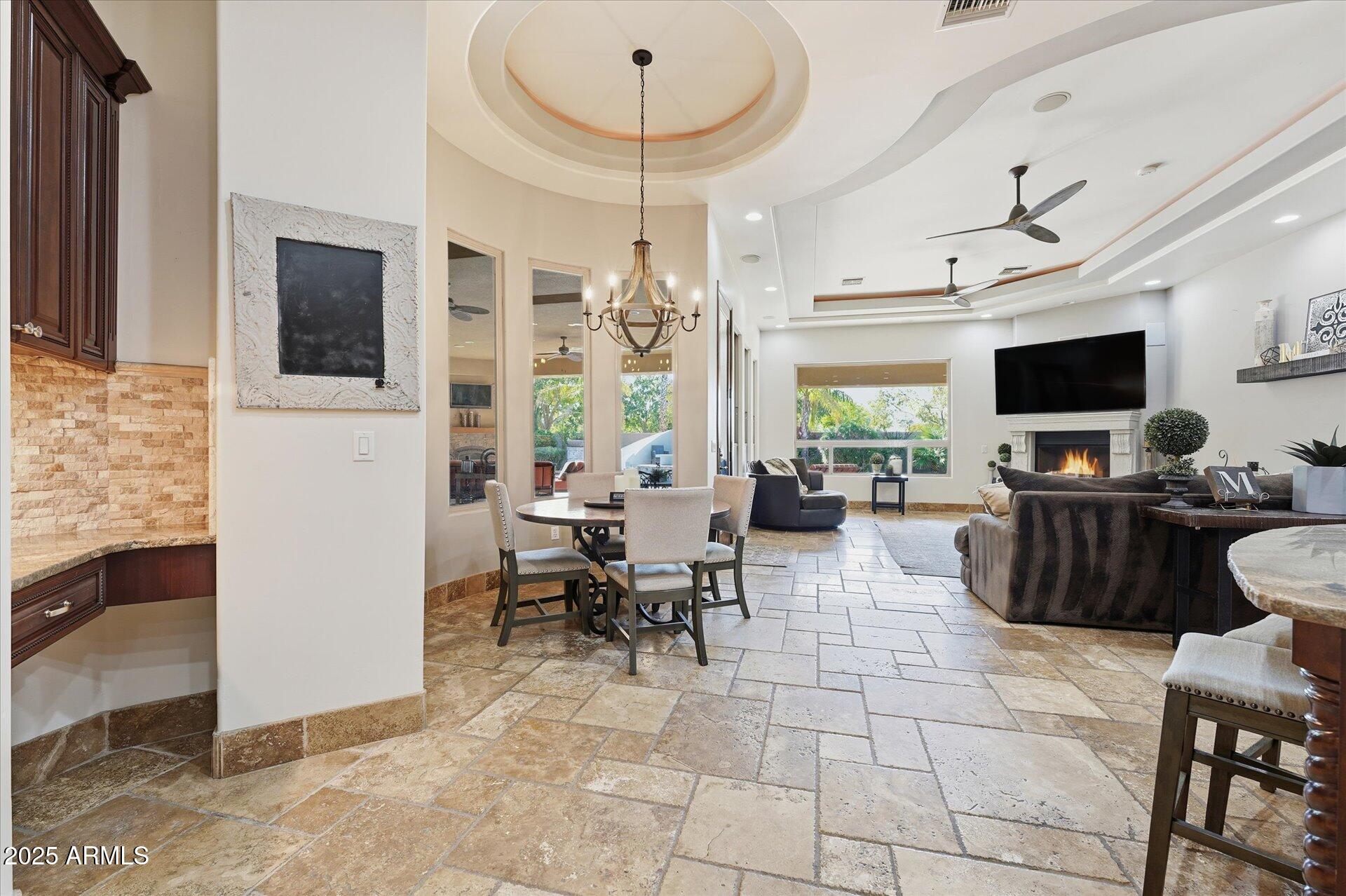 3121 East Bonanza Court Gilbert, AZ 85297 - Photo 27 of 83 a view of a livingroom with furniture and a flat screen tv